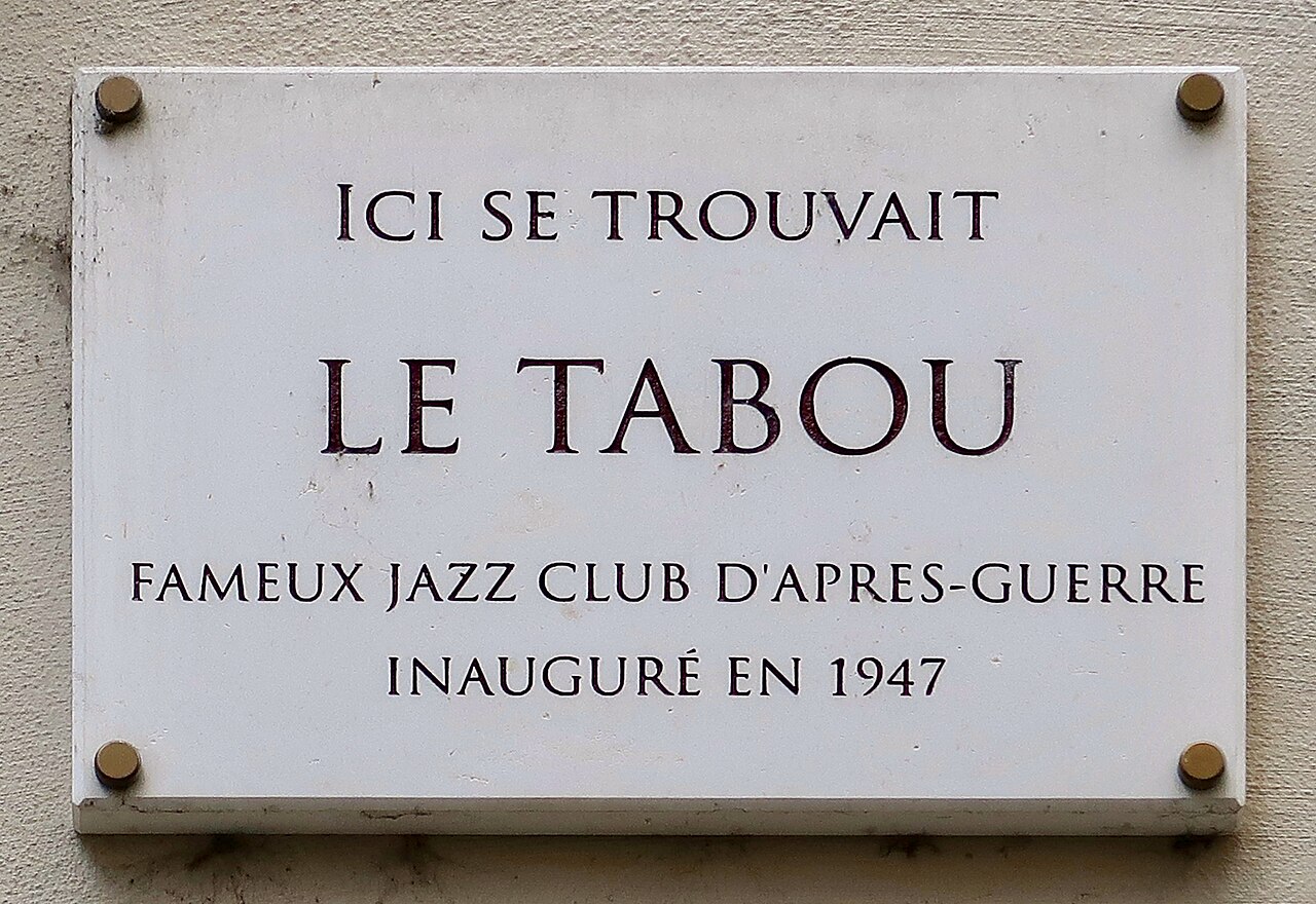 Commemorative plaque at the site of Le Tabou jazz club, corner of rue Christine and rue Dauphine, Paris 6e.